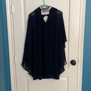 A knee length, navy blue dress.